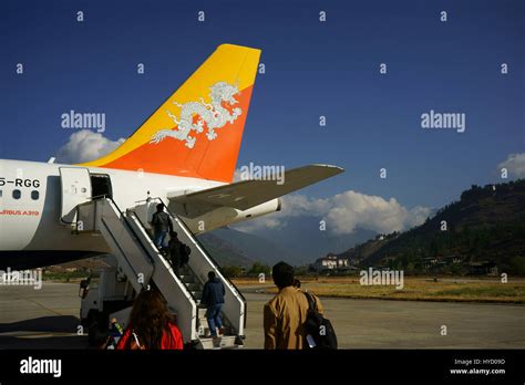 Passengers Boarding Drukair Royal Bhutan Airline Airbus A At Paro