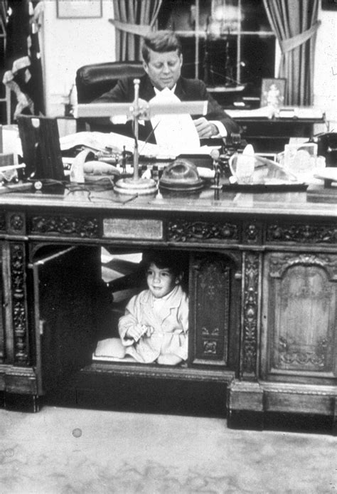 John F Kennedy Jr Plays Under His Fathers Desk In 1963 Remember Kennedy Jr John