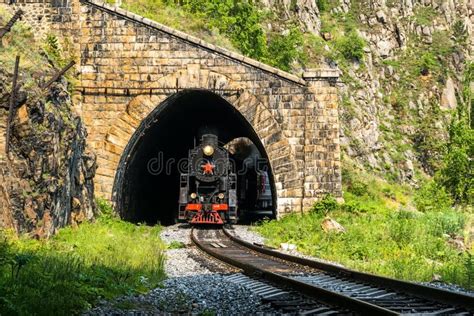 Old Steam Train Leaves The Tunnel On Circum Baikal Railway Stock Image