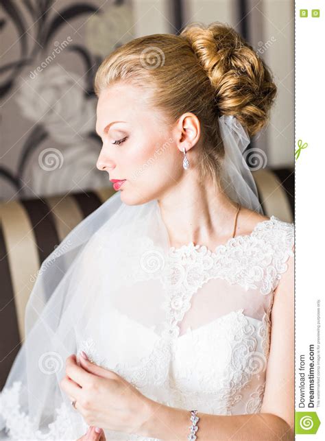 Beautiful Bride With Fashion Wedding Hairstyle Closeup Portrait Of