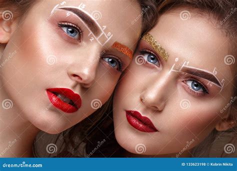 Two Girls are Twin Sisters with an Unusual Eyebrow Makeup. Beauty Face ...