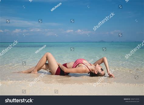Woman Red Bikini Swimsuit Laying On Stock Photo Shutterstock