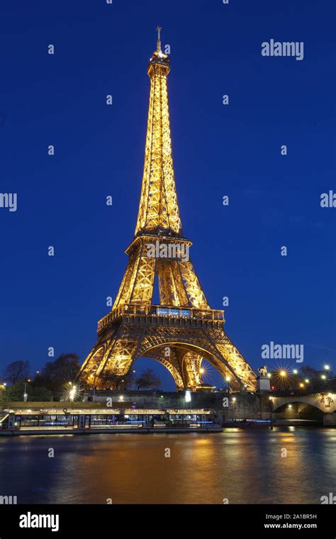 The Eiffel Tower Tour Eiffel Illuminated At Night Paris France Stock