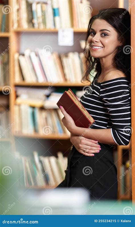 Young Brunette Woman In A Library Full Of Books Stock Image Image Of