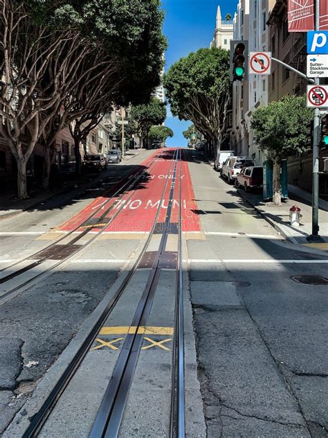 Muni Red Road Surface Painted Sign On A Street Of San Francisco Stock