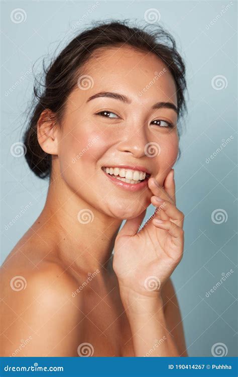 Beauty Face Smiling Asian Woman Touching Healthy Skin Portrait Stock