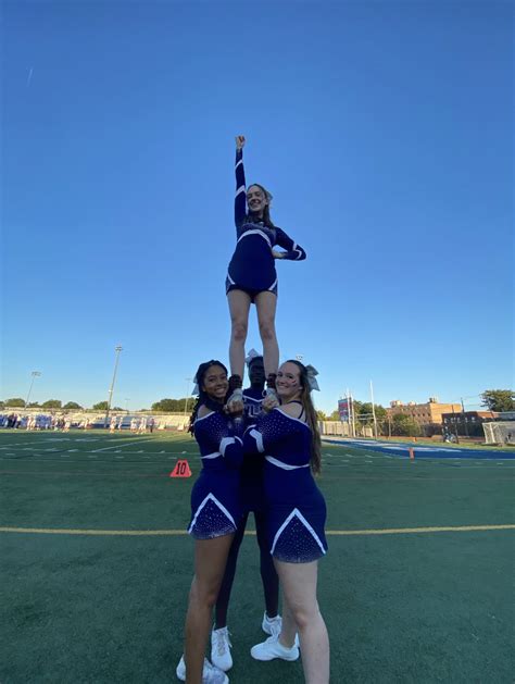 High School Cheerleaders Cheering