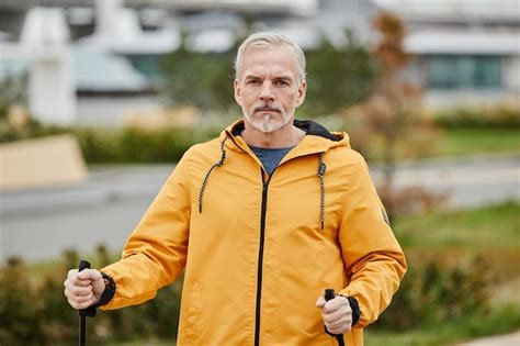 Premium Photo Waist Up Portrait Of Handsome Mature Man Walking