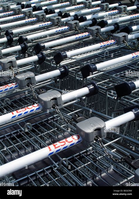 Shopping Trolleys Or Carts For A Tesco Supermarket Stock Photo Alamy