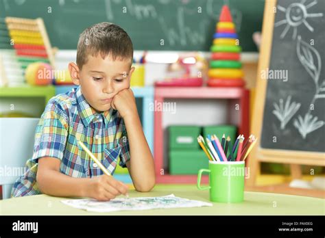 little boy drawing with pencil Stock Photo - Alamy