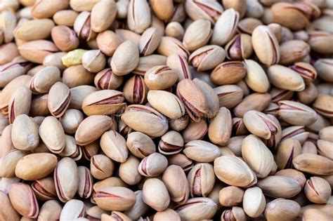 Roasted And Salted Pistachios In The Shell Texture Background Stock