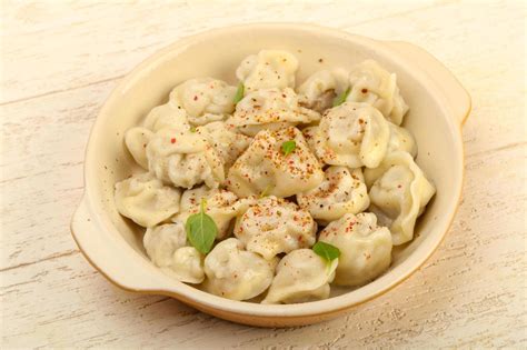 Boiled dumplings dish view 12839332 Stock Photo at Vecteezy