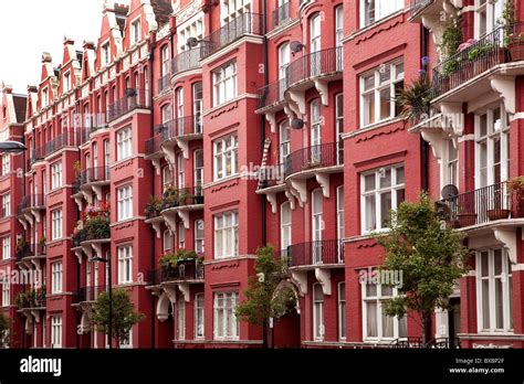 Row Of Houses With Brick Buildings Victorian Style In London England