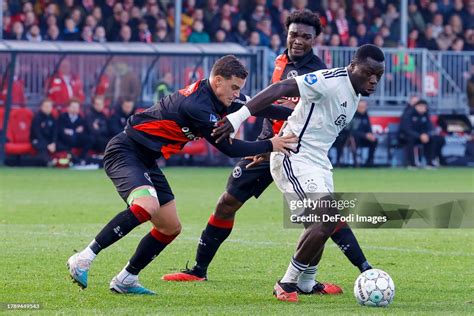 Damian van Bruggen of Almere City FC and Brian Brobbey of AFC Ajax ...