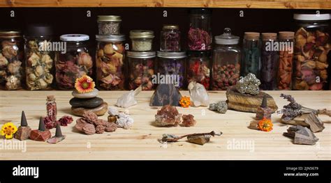 Meditation Altar With Rock Crystals And Flowers Jars Of Herbs In