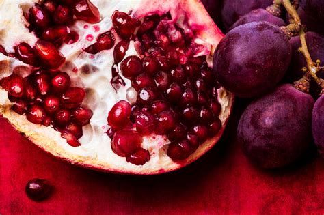 Pomegranate And Red Grapes Photograph By Alexander Senin