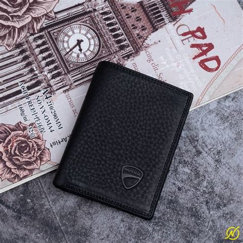 Ví da nam nhỏ có ưu điểm gì Ví da nam đứng nhỏ Novida hot nhất hiện nay Novida Rừng Thắt