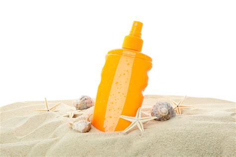 Premium Photo Sunscreen With Starfish And Seashells On Clear Sea Sand