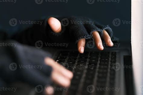 Hacker Hand Stealing Data From Laptop Top Down Stock Photo At