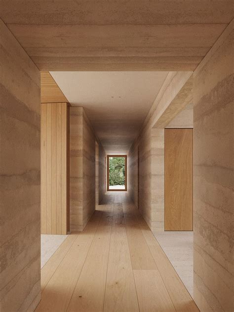 An Empty Hallway With Wooden Walls And Floor To Ceiling Windows On