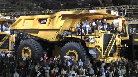 Caterpillar S Largest Trucks On Display At Minexpo Youtube