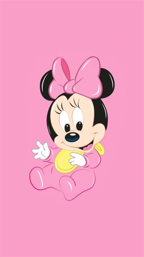 Download Cute And Bubbly Minnie Mouse In Her Signature Pink Dress Wallpaper