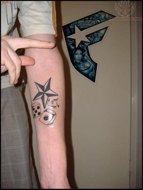 Awesome Tribal Nautical Star Tattoo Design On Arm