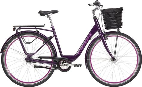 A Black Bicycle Is Shown Against A White Background With The Basket On