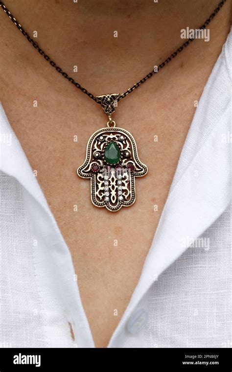 Woman Wearing A Muslim Hamsa Amulet Also Known Of The Hand Of Fatima