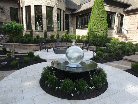 Relaxing In The Garden With The Aqualens Allison Armour Sphere Fountain