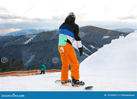 Man Snowboarding On Hill In Mountains Winter Stock Image Image Of