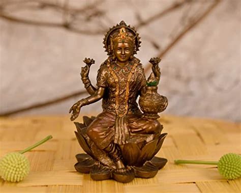 Sai Decorative Bronze Laxmi Mata Blessing Sitting On Lotus With Kalash