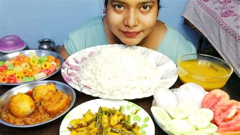 Eating Egg Aloo Ki Spicy Curry Aloo Beans Fry Dal Papad Salad With Rice