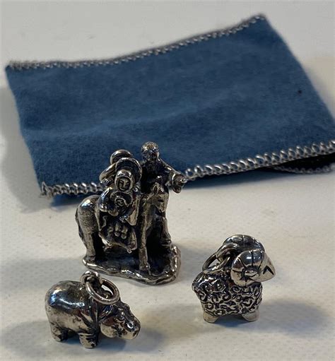 Lot Three Sterling Silver James Avery Charms