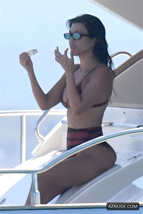 Kourtney Kardashian Wearing A Two Piece Bikini While Enjoying Her Vacation In Sardinia AZNude
