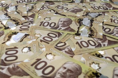 100 Canadian dollar banknotes. Stock Photo by ©FER737NG 26509733