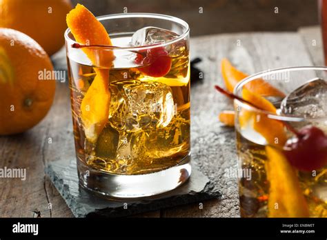 Homemade Old Fashioned Cocktail With Cherries And Orange Peel Stock