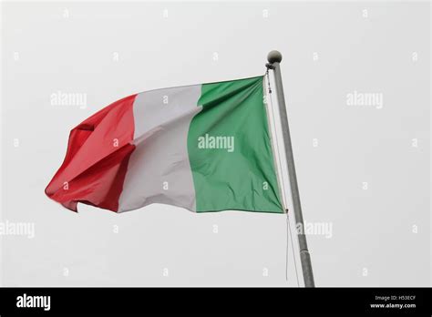 Hand Proudly Waving The National Flag Of Italy Stock Photo Alamy