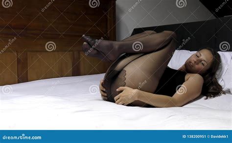 Glamour Model Posing On Bed In Black Lingerie Stock Image Image Of People Model 138200951