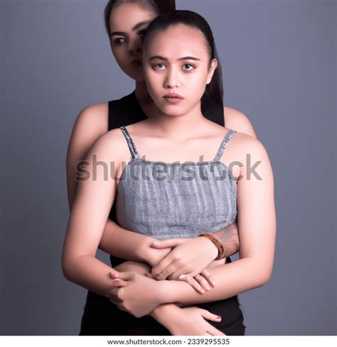 Studio Shot Photo Filipino Lesbian Hugs AI Generated Image 2339295535