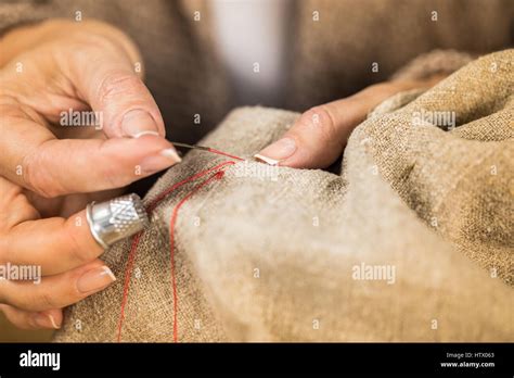 Woman Sewing Cloth Stock Photo Alamy
