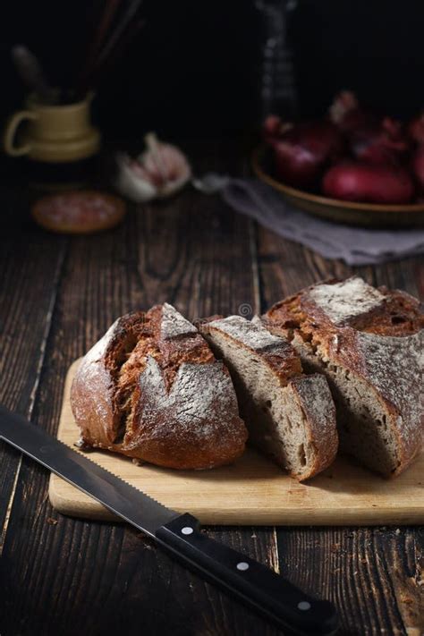 A Loaf Of Rye Bread In Rustic Style Stock Photo Image Of Loaf Wood