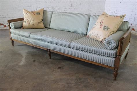 Vintage Hollywood Regency Neoclassic Sofa With Caned Sides For Sale At