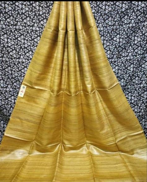 Festive Wear Golden Tussar Ghicha Silk Plain Saree M With Blouse