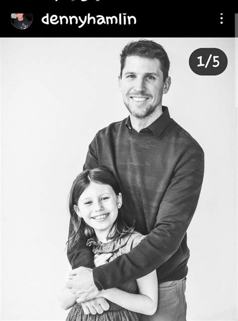 A Black And White Photo Of A Father Hugging His Daughter For The First