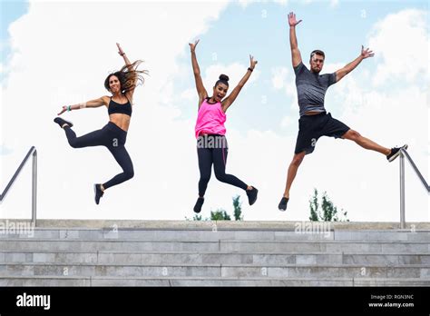 Young Athletes Jumping Joy Stairs Hi Res Stock Photography And Images