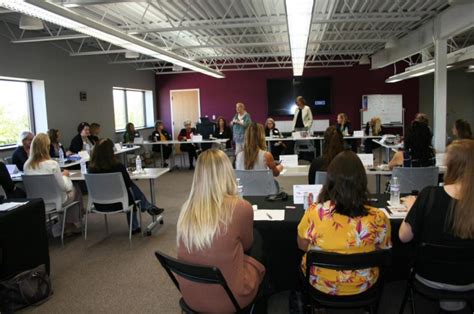 Julie Newhouse Of Ripon Printers Speaks To Capacity Gathering At Women