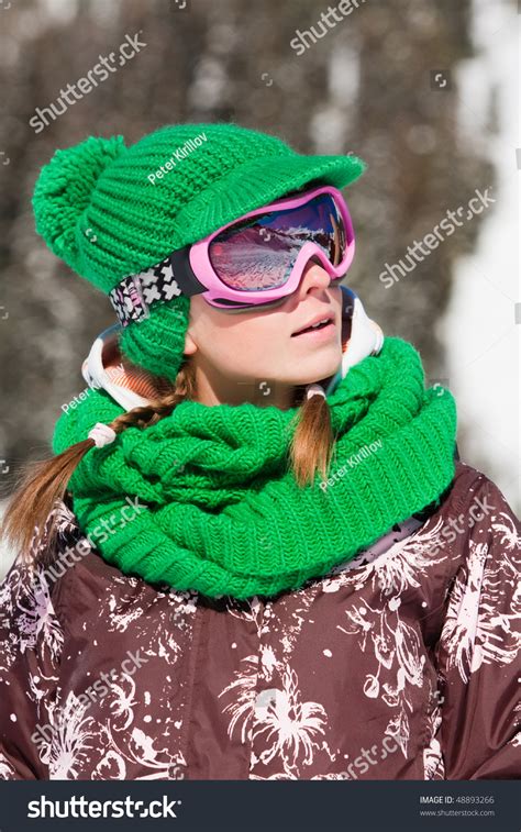 Young Sporty Girl Wearing Ski Mask And Hat. Winter Vacation In Alps ...