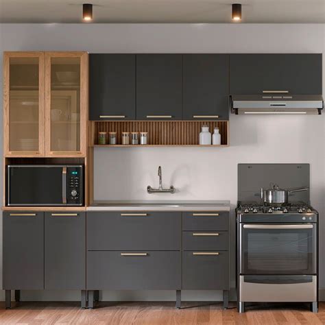 A Kitchen With Gray Cabinets And Stainless Steel Appliances