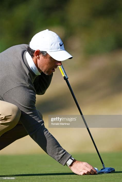 Rory Mcilroy Of Northern Ireland Lines Up A Putt On The Fourth Green